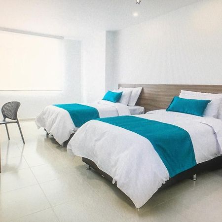 Torca Hotel كالي المظهر الخارجي الصورة