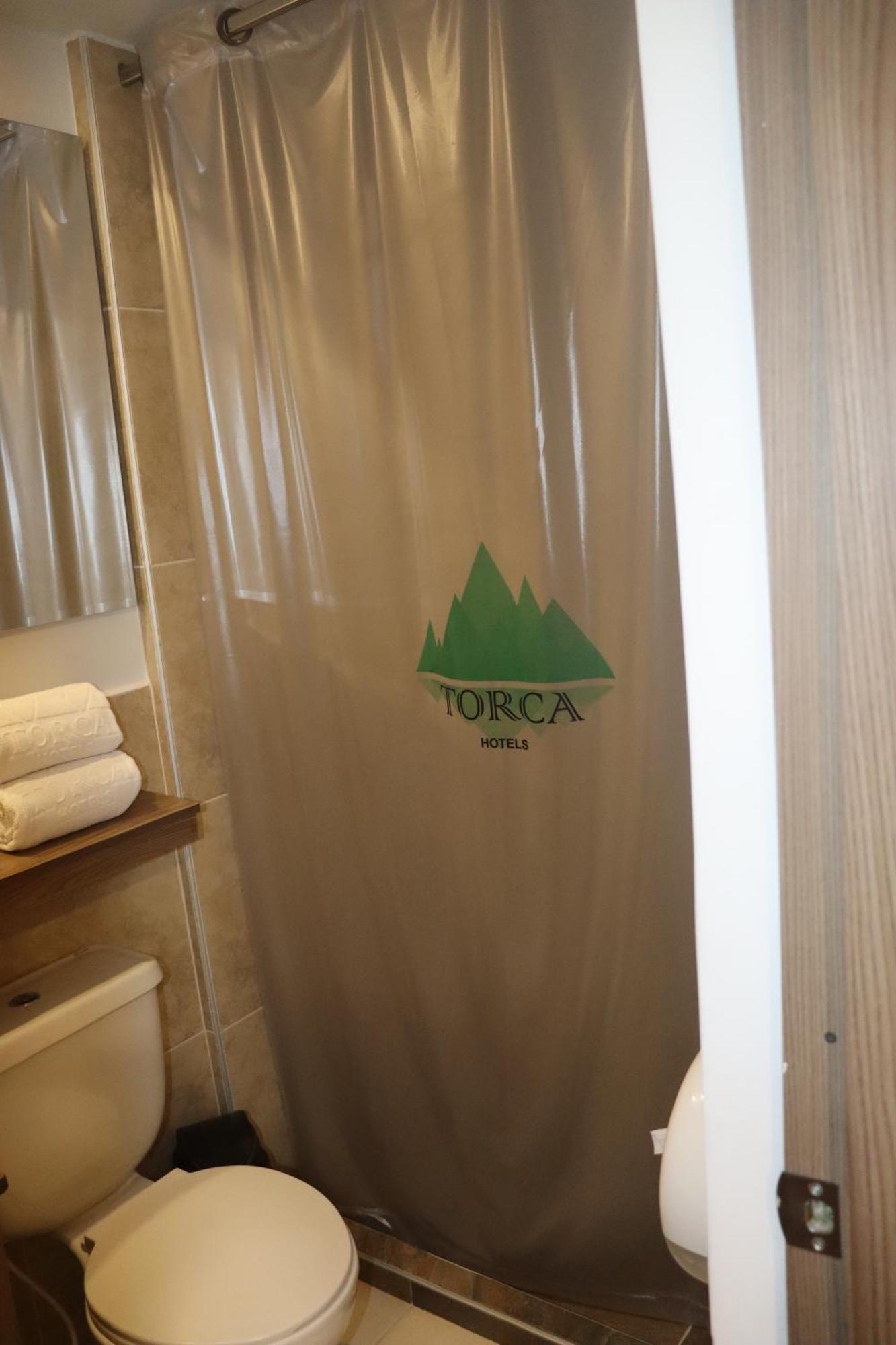 Torca Hotel كالي المظهر الخارجي الصورة